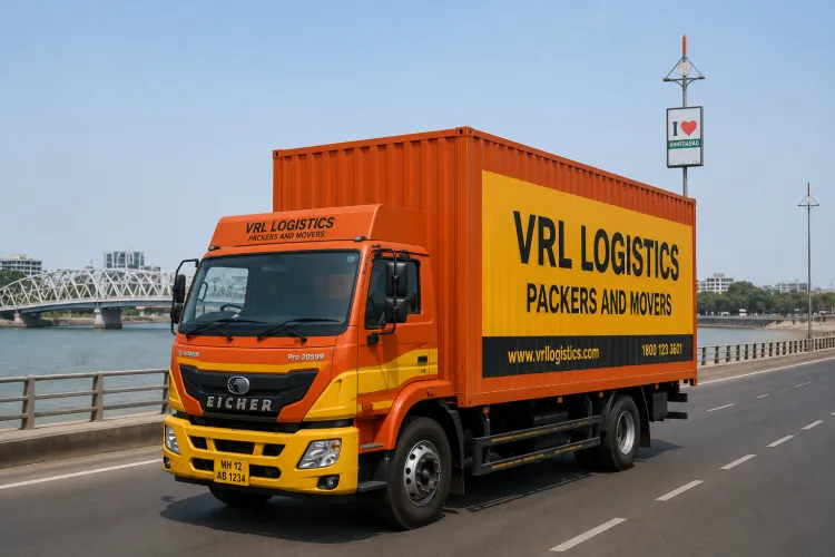 VRL Logistics Packers and Movers branded truck providing safe, GPS-tracked goods transport in Ahmedabad