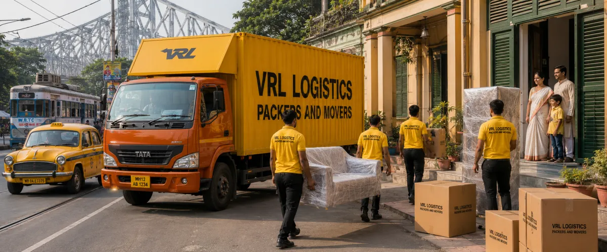Packers and Movers in Kolkata — VRL Logistics team loading a branded moving truck for a household relocation